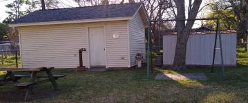 View of Detached Outbuildings in the Backyard